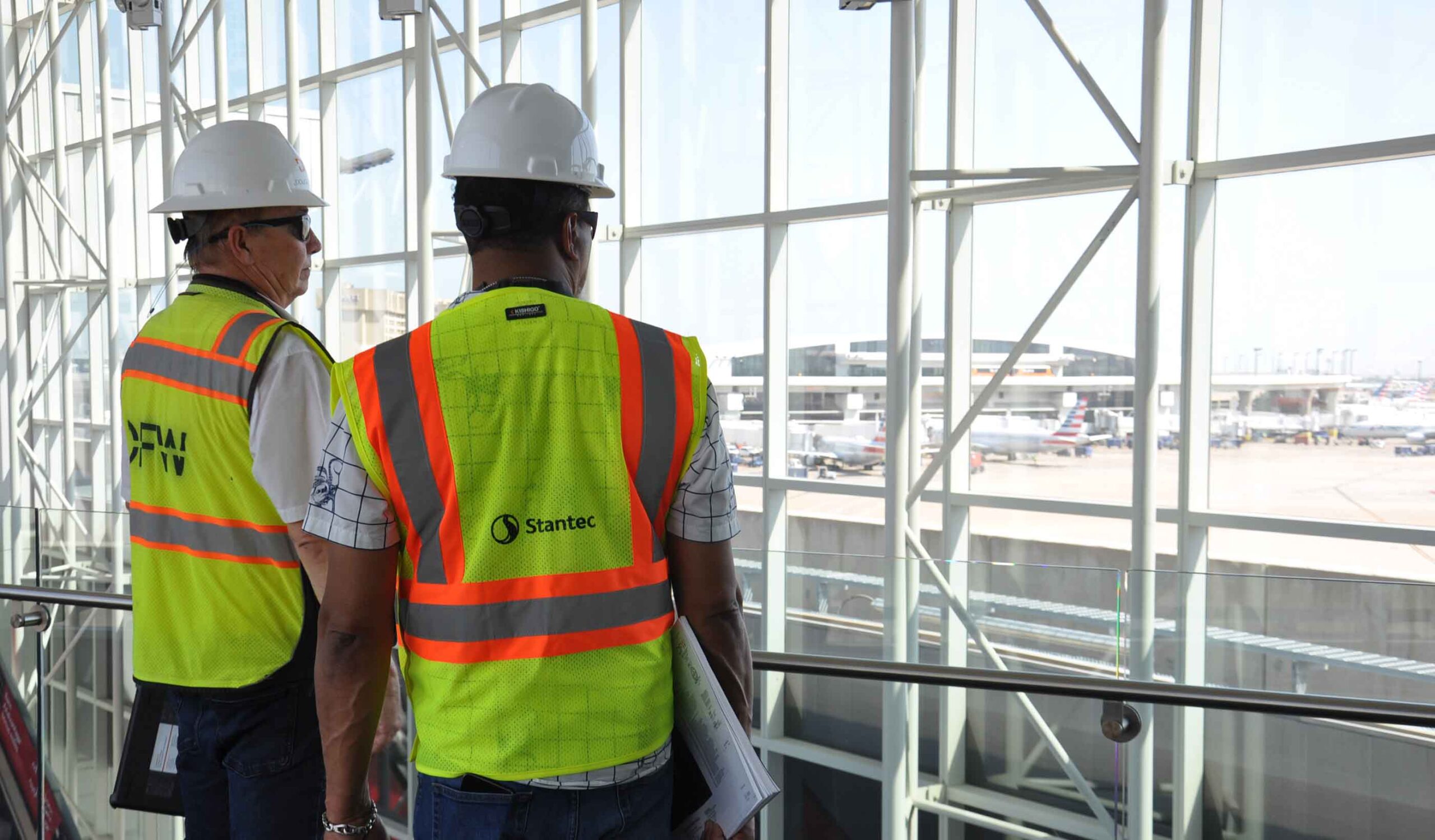 Doug Ritter and Allen Batchelor looking out at the airside